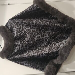 Adorable faux fur edged and lined poncho